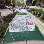 Tents outside the First Street U.S. Courthouse in Los Angeles, where homeless advocates and supporters rallied as the U.S. Supreme Court in Washington D.C. heard oral arguments in the Grants Pass case, on April 22, 2024. Photo by Ted Soqui for CalMatters