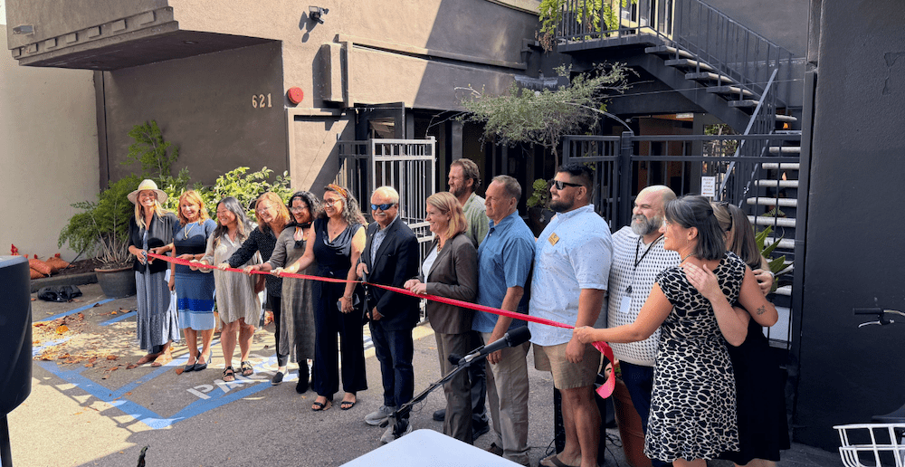 “FARO Center Ribbon Cutting June 24, 2024”: Representatives from local government, community organizations, and service providers cut the ceremonial ribbon in recognition of the FARO Center opening.