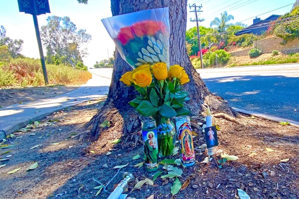 A memorial on Cliff Drive in Santa Barbara has been set up where pedestrian Juan Lopez was struck and killed by a hit-and-run driver on June 29, 2024. Santa Barbara Police arrested Brock Alexander Hoffman, 55, on felony charges. (Photo by John Palminteri)