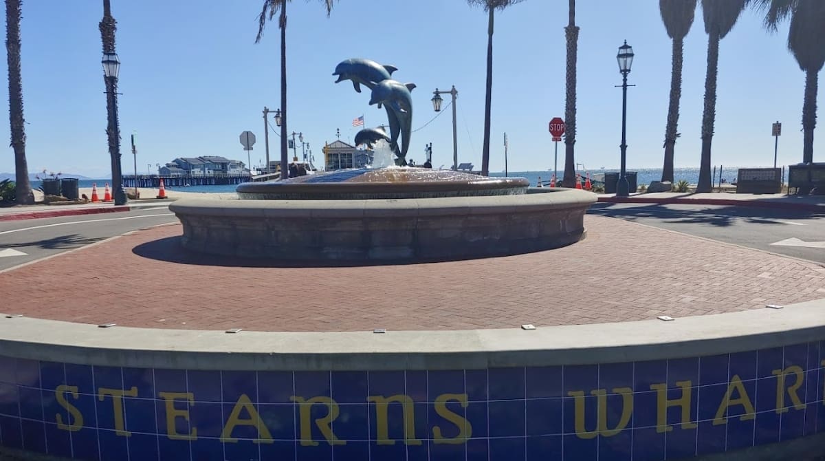 Bronze sculpture of a dolphin family at the base of Stearns Wharf. Known as Santa Barbara’s Bicentennial Friendship Fountain, the fountain was created in 1982 by local artist Bud Bottoms. Image Source: Stearns Wharf Santa Barbara website