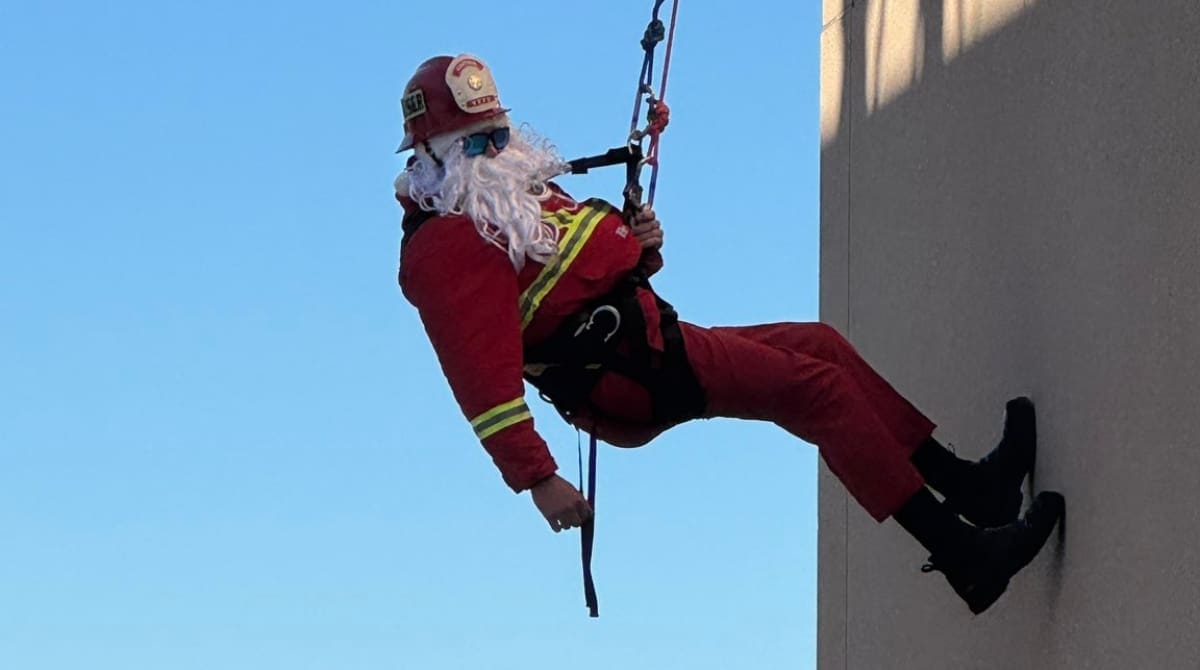 Ventura County Fire personnel dressed up as Santa Claus to surprise patients at the pediatric unit of the Ventura County Medical Center. Image Source: Ventura County Fire/X