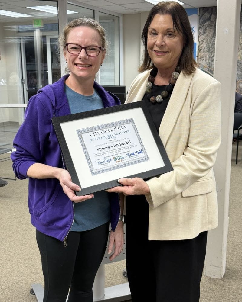 Rachel accepting the Certificate from Mayor Perotte