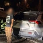 CHP officers arrest the driver on suspicion of DUI. Image Source: Facebook/California Highway Patrol