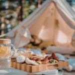 Representative picture of a glamping site. Image Source: Madalina Todica’s Images/Canva
